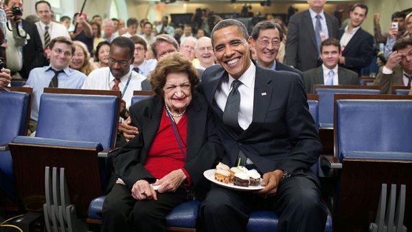 President Barack Obama presents cupcakes with a candle to Hearst White House columnist Helen Thomas in honor of her birthday in the James Brady Briefing Room, on Aug. 4, 2009. Thomas, who turned 89, shares the same birthday as the President, who turned 48. (Source: Official White House Photostream/Pete Souza)