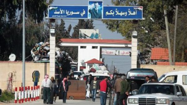 Syrians crossing into Lebanon on March 22 (Daily Star/ Nidal Solh)