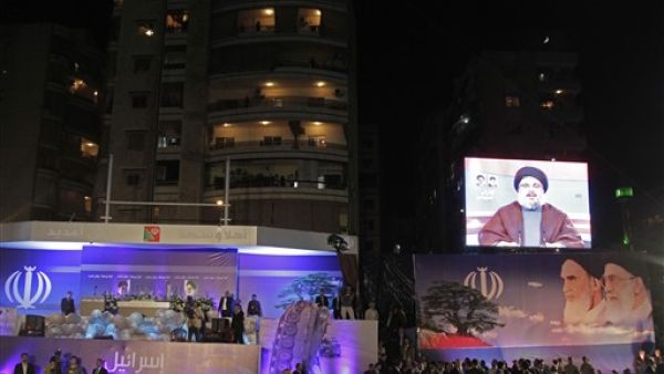 الرئيس الإيراني يستمع إلى حسن نصر الله عبر شاشة تلفزيونية-ا.ف.ب