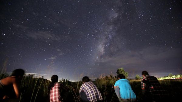 Eager spectators await a meteor shower.  (AFP/File)