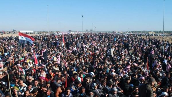 Iraqi protestors call for the release of prisoners they allege were arrested on sectarian grounds by Iraq's Shiite-led authorities during a demonstration in Ramadi, Anbar's provincial capital, on Friday. (AFP)