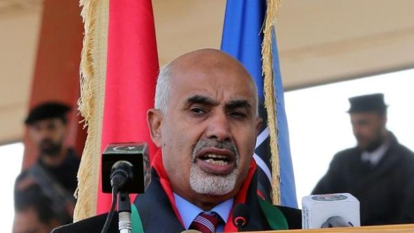 Mohammed el-Megarif delivers a speech during a police graduation ceremony at a police academy in the district of Salaheddin in Tripoli. (AFP PHOTO/MAHMUD TURKIA)
