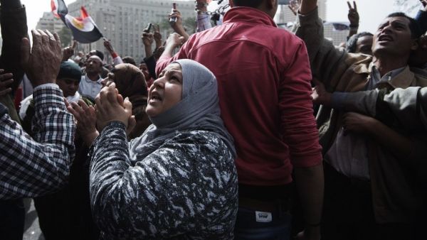 Egyptian women shout slogans against President Mohamed Morsi's government at Tahrir square. (AFP PHOTO/GIANLUIGI GUERCIA)
