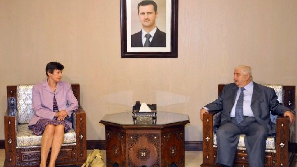 Syrian Deputy Prime Minister, Foreign and Expatriates Minister Walid al-Moallem (R) meets with a Angela Kane (L), the UN high representative for disarmament, in Damascus on August 25, 2013. (AFP)