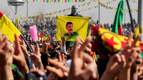 Kurds celebrate on March 21, 2013 Nowruz, the Persian New Year festival, and flash victory signs in the southern Turkish city of Diyarbakir. (AFP)