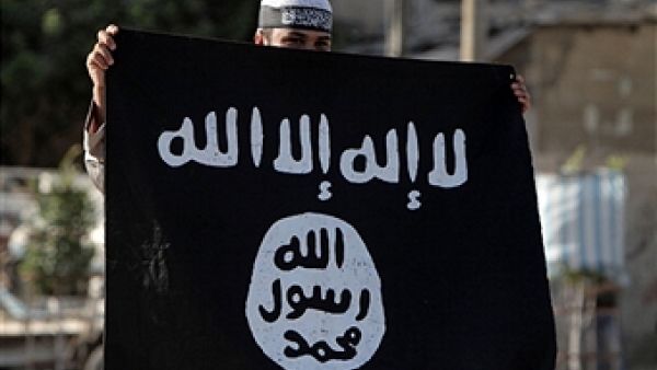 A Palestinian Salafist holds an Al-Qaeda-affiliated flag during a protest against an amateur film mocking Islam in Rafah in the southern Gaza Strip on September 14, 2012. (SAID KHATIB/AFP/GettyImages)