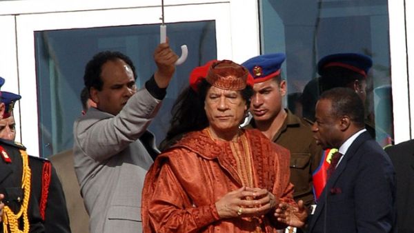 A dry leader keeps 15 second speech short to the point: Rain prevented him speaking further to the Libyan Youth