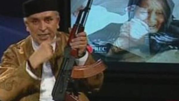 Libyan State TV presenter shows the rebels who's the boss.