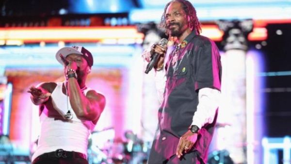 50 Cent performs with Snoop Lion (formerly Snoop Dogg) earlier this year