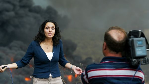 Foreign press and reporters under fire:  finding themselves caught up in  the protest.