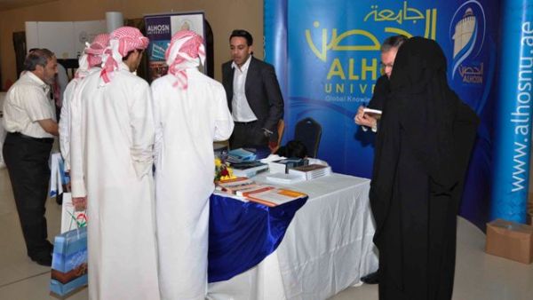 ALHOSN University's booth at Al Gharbia Universities and Colleges Fair
