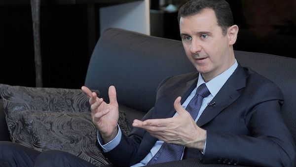 Syria's Information Minister said this week that the "Syrian street" wants Assad to run for president in this year's upcoming elections (File Archive/AFP)