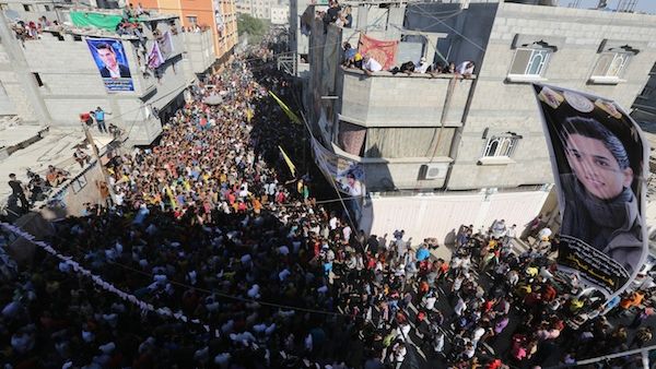 Fans wait for the arrival of Palestinian "Arab Idol" Mohammed Assaf in front his home in Khan Yunis town in the southern Gaza Strip on Tuesday (AFP)