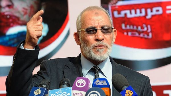 Muslim Brotherhood leader Mohammed Badie speaking during a press conference at the party's headquarters in Cairo in 2012. Badie and other high ranking MB officials have been sent to the Egyptian criminal court after being accused of inciting violence against anti-Morsi protesters. (AFP/File)