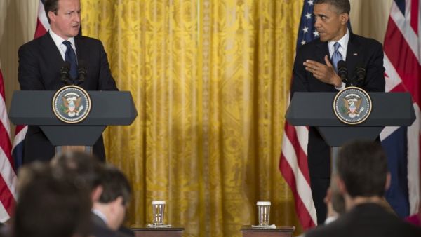 Cameron and Obama during a press conference after their meeting in Washington on Monday. (AFP PHOTO/JIM WATSON)