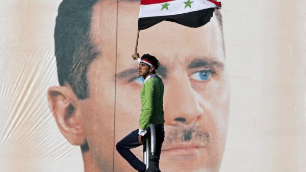 Syria is still at the mercy of "kidnapper" Bashar Al-Assad. (Image source: "blogs.voanews.com")