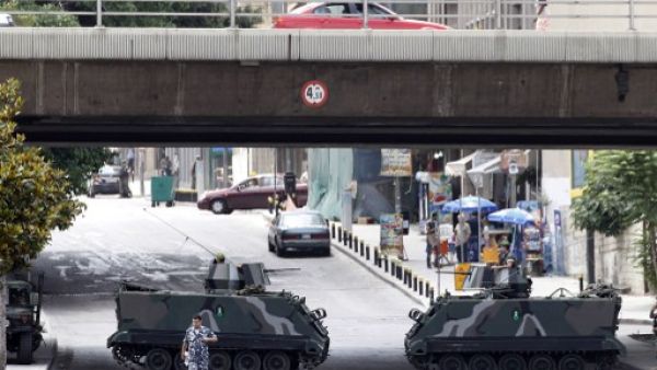 Lebanese soldiers stand guard on tanks on the fringe of a protest in Beirut on Sunday. AFP image for illustrative purposes.