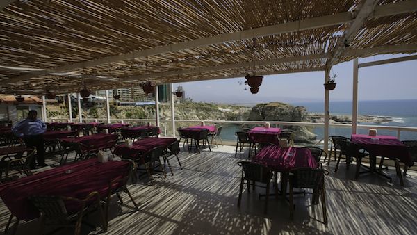 With its isolated coffee shops and restaurants, Beirut seems to have lost its old charm. Pictured: an empty Beirut Restaurant.
