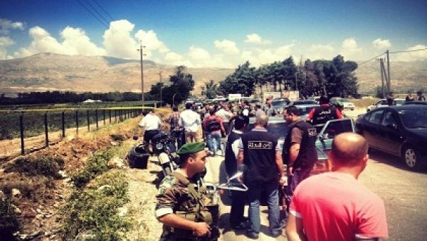 An image of the chaos in the aftermath of the roadside bomb. Image courtesy of naharnet.com