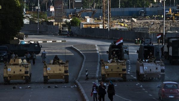 Egyptian army armoured personnel carriers (APC) are seen stationed in front of the Egyptian Museum in Tahrir Square on August 18, 2013 in Cairo. (AFP)