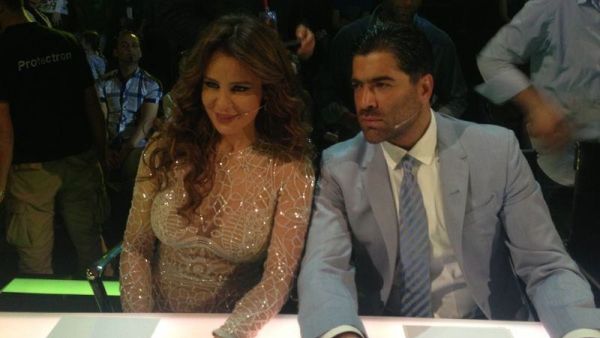 Carole and Wael get down to business.