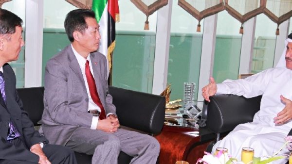 UAE Minister of Economics during his meeting with the Chinese Ambassador UAE Minister of Economics during his meeting with the Chinese Ambassador