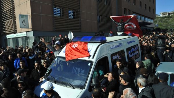The body of Tunisian opposition leader and outspoken government critic Chokri Belaid, shot dead with three bullets fired from close range by a man wearing a traditional long garment with a pointed hood on Wednesday.