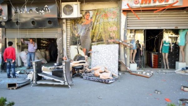 A SANA handout picture shows the devastation in the Christian suburb of Qassaa in Damascus after mortar rounds killed eight people in the capital on Sunday. (AFP/SANA)