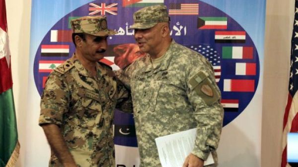 Operations Chief-of-Staff of the Jordanian armed forces Awni al-Adwan and US Major General Robert G. Catalanotti (R) are seen during a joint press conference announcing details about "Exercise Eager Lion" in Amman on Sunday. AFP