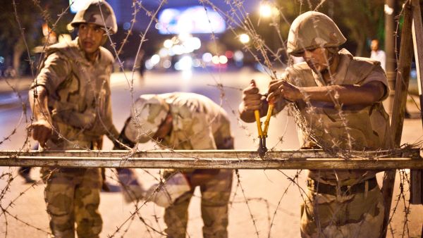 The nighttime curfew that applies across 14 of Egypt's governorates may be extended beyond mid-November. (AFP/File)