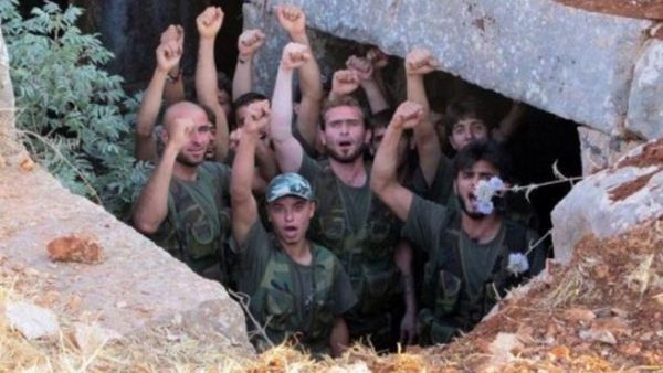 AFP PHOTO / HO / SHAAM NEWS NETWORK: FSA soldiers on a training exercise