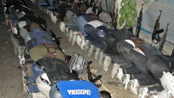 A handout picture released by the opposition-run Shaam News Network on June 21, 2013 shows rebel fighters praying in Syria's central city of Homs on June 17. (AFP/MOHAMMED IBRAHIM / SHAAM NEWS NETWORK