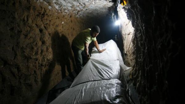 Palestinians in Gaza have previously used tunnels to Egypt to obtain construction materials under the Israeli ban (Courtesy of Eyad Baba/AP)