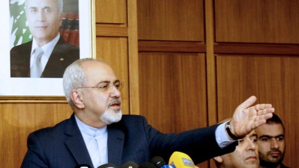 Iranian Minister of Foreign Affairs Mohammad Javad Zarif speaks to journalists at Rafic Hariri International airport in Beirut on January 12, 2014 upon his arrival for a one day visit to Lebanon to meet Lebanese officials. Iran and Lebanon are looking to boost their bilateral ties. (AFP)
