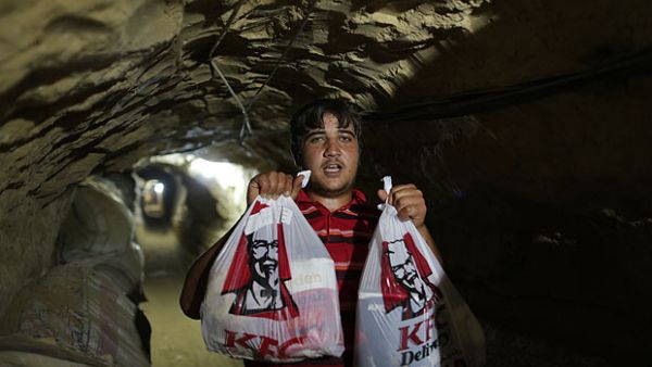 Chicken run: KFC gets smuggled from Egypt into Gaza through tunnels. (Photo courtesy of BuzzFeed) Chicken run: KFC gets smuggled from Egypt into Gaza through tunnels. (Photo courtesy of BuzzFeed)