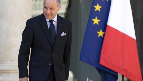 France's Foreign Affairs minister, Laurent Fabius leaves the Elysee Palace after the weekly cabinet meeting, on August 21, 2013 in Paris. (AFP)