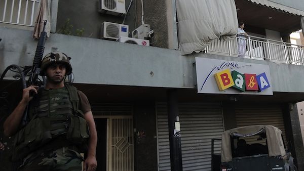 A Lebanese army soldier monitors as they perform search operations in the Abra district of the southern Lebanese city of Sidon on Monday. (AFP)