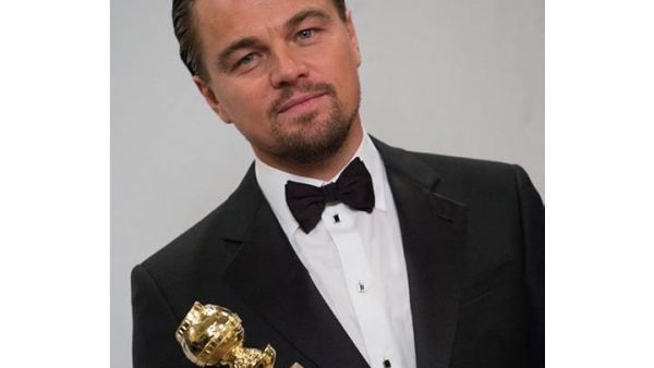 Leonardo DiCaprio with his award for "The Wolf of Wall Street" (Image: Facebook)