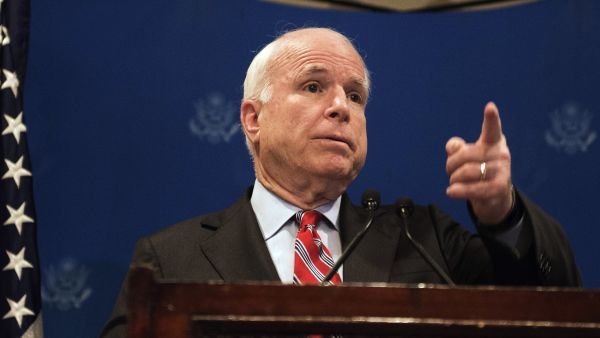 US Republican Senator John McCain and Republican Senator Lindsey Graham (unseen) address a news conference on August 6, 2013 in Cairo, Egypt. (AFP/GIANLUIGI GUERCIA)