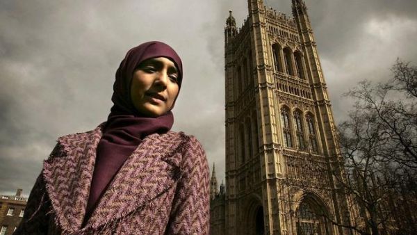 A British Muslim poses outside Westminster 