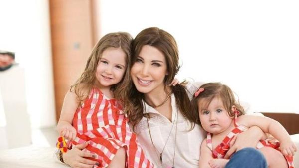 Nancy with her daughters Ella and Milla