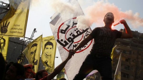 Supporters of Egyptian ousted president Mohamed Morsi and of the Muslim brotherhood movement demonstrate against the military in Cairo's eastern Nasr City district. (AFP)
