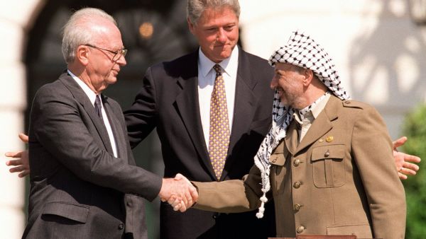 Yitzhak Rabin, Bill Clinton, and Yasser Arafat at the Oslo Accords signing ceremony on 13 September 1993. (File) Yitzhak Rabin, Bill Clinton, and Yasser Arafat at the Oslo Accords signing ceremony on 13 September 1993. (File)