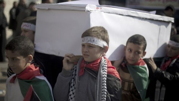 A lack of food and medical supplies is also causing death in Yarmouk. Here, Palestinian children in Gaza stage a fake funeral in solidarity with their brothers in the besieged Damascus camp. (AFP/File) A lack of food and medical supplies is also causing death in Yarmouk. Here, Palestinian children in Gaza stage a fake funeral in solidarity with their brothers in the besieged Damascus camp. (AFP/File)