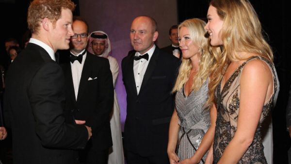 Prince Harry at the 'Forget Me Not' reception with Joss Stone and presenter Denise Van Outen in Dubai yesterday. Meeting lovely ladies isn't distracting the Prince from his royal romance. (Photo by Chris Jackson/Getty Images)