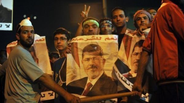 Supporters of ousted president Mohamed Morsi protest in Cairo on July 30, 2013 (AFP)