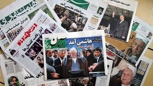 Iranian newspapers show their support of Rafsanjani, before his disqualification by the GC. AFP Photo