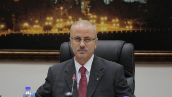Rami Hamdallah, the prime minister of the Palestinian Authority, was stopped at a Ramallah checkpoint by Israelis on Tuesday. (AFP/File)