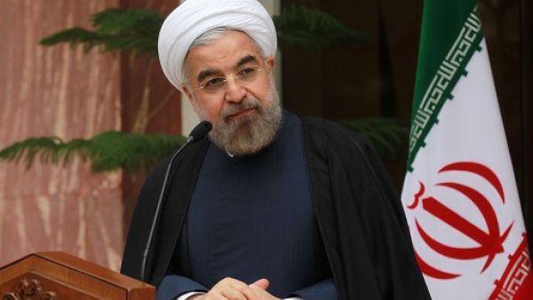 IRAN, Tehran : A handout picture released by the Iranian presidency shows the Islamic Republic's President Hassan Rouhani speaking during a press conference on November 24, 2013 in Tehran a day after world powers forged a deal with Iran in Geneva. (AFP)