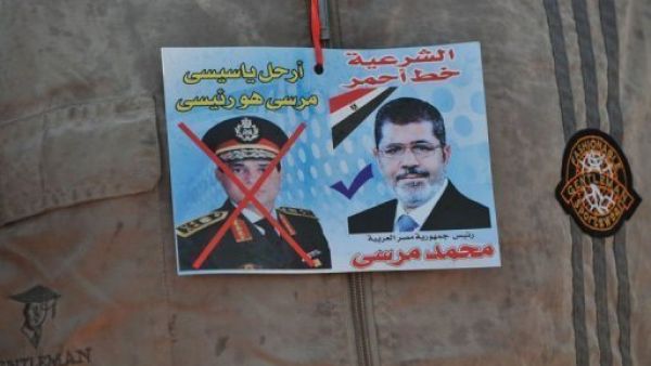 During an interview with Al Masry Al Youm, Egyptian Defence Minister Abdel Fattah El Sisi revealed that before Morsi's ousting, he attempted numerous times to reconcile the Muslim Brotherhood and opposition forces. (AFP/File)